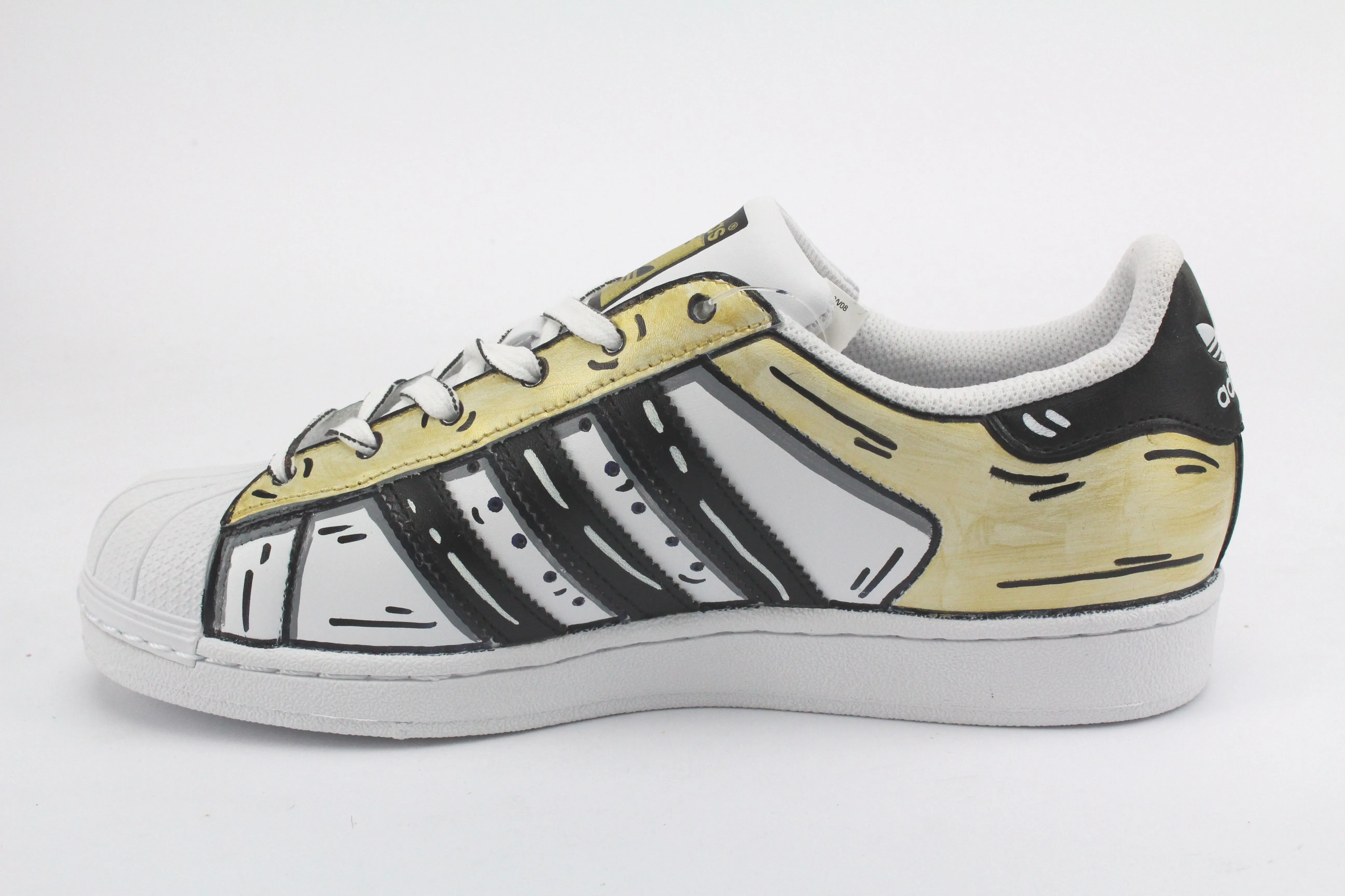 Adidas Superstar Cartoon Gold e lacci cartoon