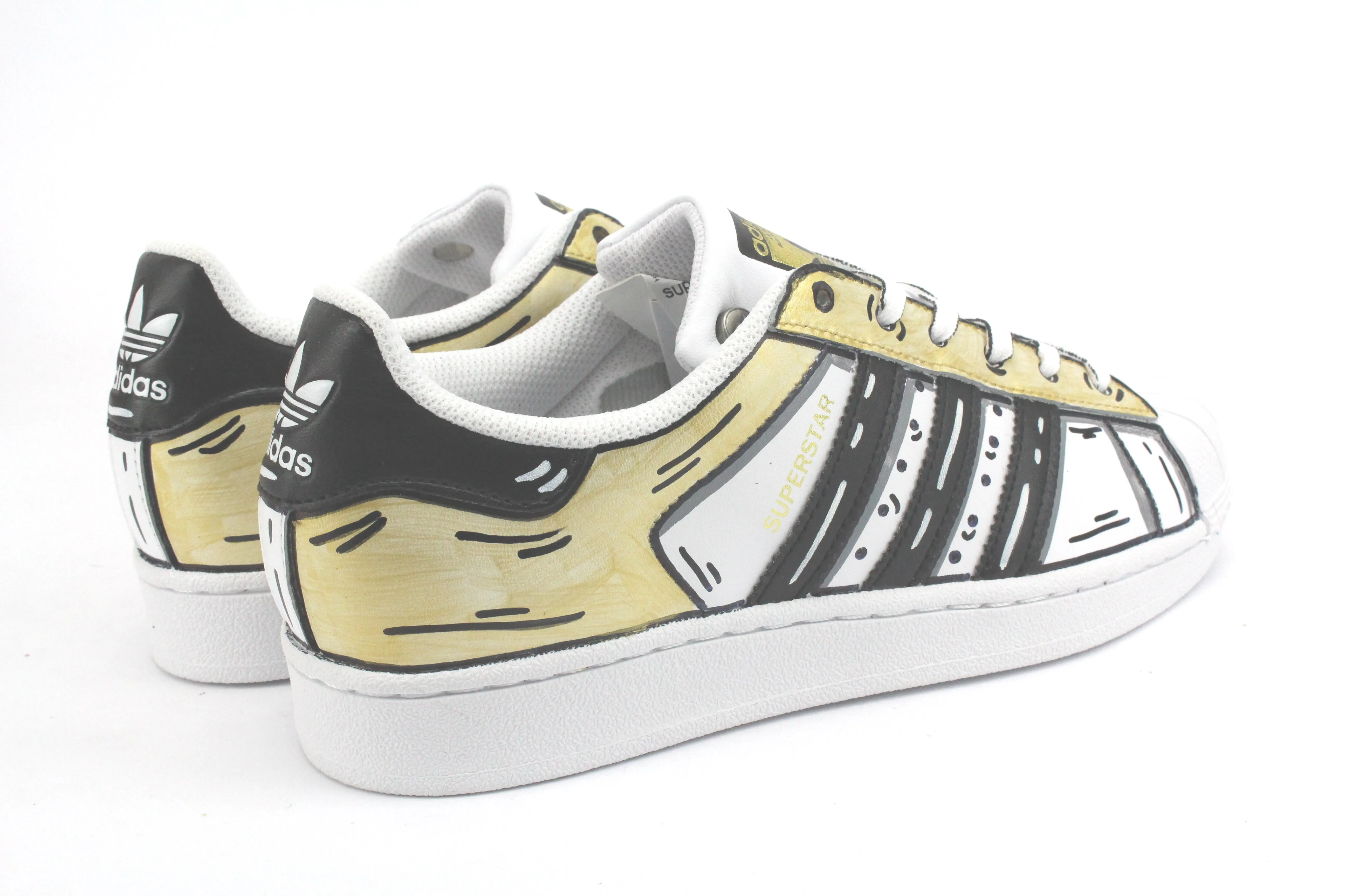 Adidas Superstar Cartoon Gold e lacci cartoon